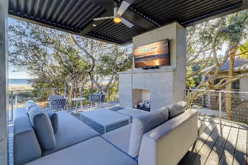 Outdoor Living Area at 24 Duck Hawk-Oceanfront, Large Pool & Amazing Game Room. Coastal Chic