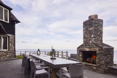 Outdoor dining at HILLBROOK ESTATE WHANGAMATA, NEW ZEALAND