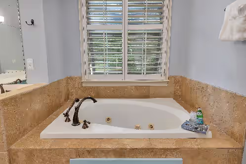 Bathroom at Beautiful Large Home with Pool, Riverfront Dock, Gourmet Kitchen and Kids Bunk Room