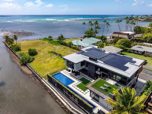 An exclusive aerial angle highlights the villa’s contemporary lines, private pool, and oceanfront perch. at Ocean Villa