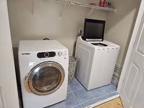Washer and dryer at Need a great beach getaway INDOOR AND OUTDOOR POOL