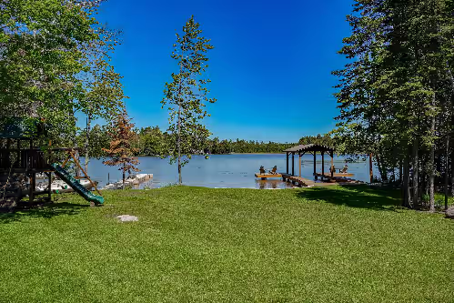 Luxury lakefront home with high-speed WiFi, dock, private beach, & theater room, photo 4
