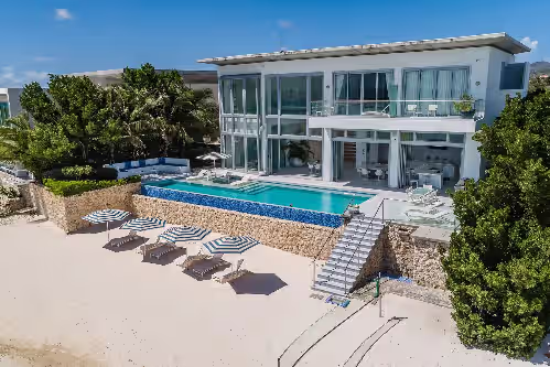 Beachfront Villa Infinity Pool, Gym, Media room. 6 Bedrooms 7 baths. Sleeps 13