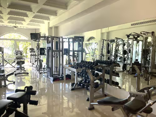 Fully equipped gym with ocean view at Luxury House On The Beach Villa Bianca Cancun, Hotel Zone Full Gym Chef Included