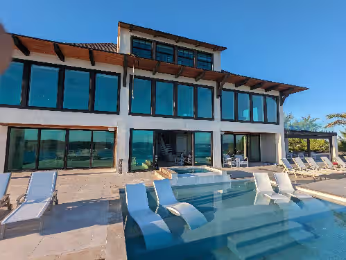 Beachfront estate home with private 70' dock and 7500sq ft. of living space