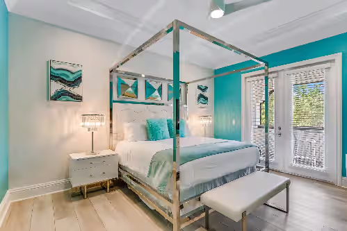 Master suite #9. King size bed, access to balcony, and en-suite bathroom at The One