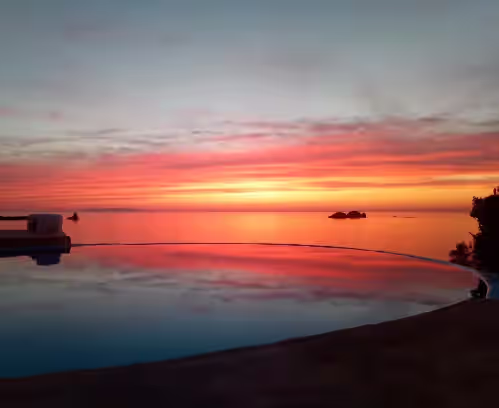 Traditional Cycladic style, waterfront Villa with unique pool and sunset view