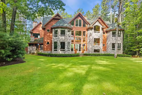 Luxurious 11,600 SQ' Mullett Lake Home & Carriage house,Private on Mullett Lake