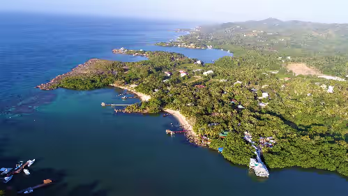 The Dock Resort , two archers of adventure and or tranquility at The Dock Resort: Includes boat for snorkeling out at the
