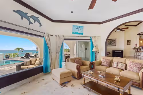 Bedroom 1, 2 & 3 - Living Room View - Dolphin at Villa Anguillitta Entire 7BD Villa w/ Private Beach Access, Sauna, Gym, &