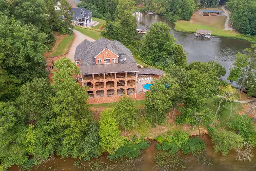 Executive Mansion at Lake Gaston sleeps 40 and has HEATED POOL.