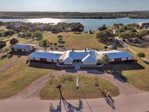 The Estate on Lake Travis - 10 Acre Lakefront Retreat (Sleeps 40 Guests) with Pool, Boat Dock, Hot Tub, Gameroom, Private Cove, & More!
