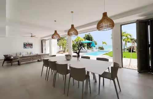 Dining at Villa à St François G290 5 ch vue mer piscine