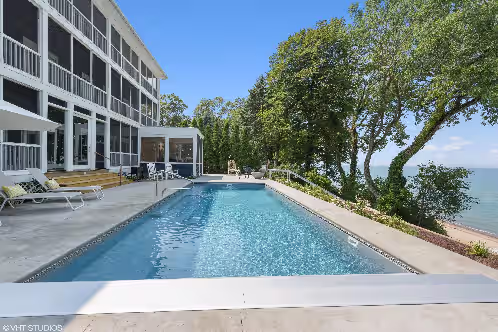 Lakefront Modern Mansion With Heated Pool 9BRs On Private Sandy Beach