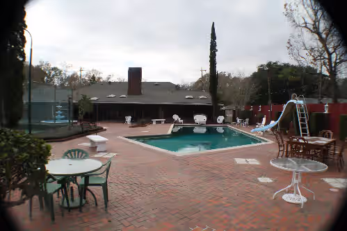 House view from clubhouse at Home/MINI RESORT- pool, tennis court, par 3/four hole golf course, lg. Clubhouse