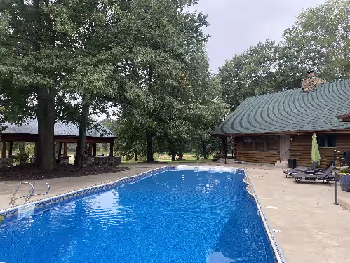 Pool at Secluded Executive Log Cabin Lodge with 68 ft Pool on 102 acres