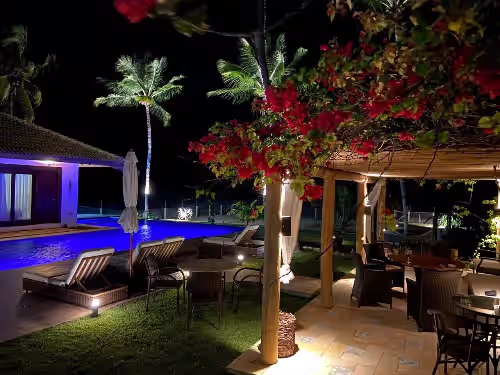 Outdoor dining at Luxury beachfront property