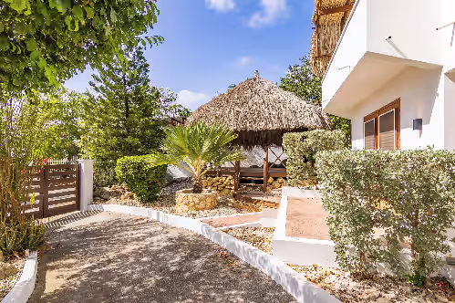 Shaded palapa with tropical garden views at Amazing Villa for 10 guests w/ Private Pool, Intimate Outdoors & Ocean Panoramas