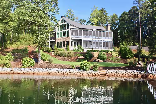Gorgeous Estate w/180° views of the lake and 300+ ft of waterfront!