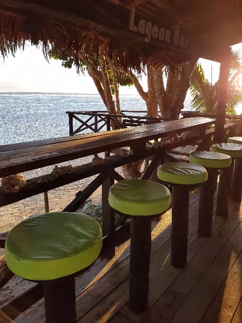 Outdoor dining at Coral Palms Exclusive Beachfront ResortA 5-star resort all to yourself