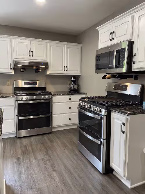 Two double oven ranges w/ convection bake (new in 2023) at 13-Bedroom Family-Friendly Lodge. Quiet. Spacious. 2 Ponds.