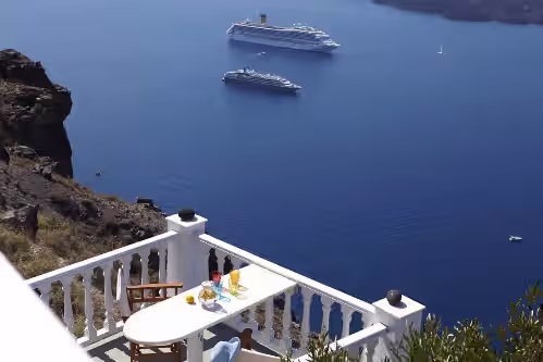 Outdoor dining at Private And Secluded Luxury Villa With Pristine Sea/Volcano View