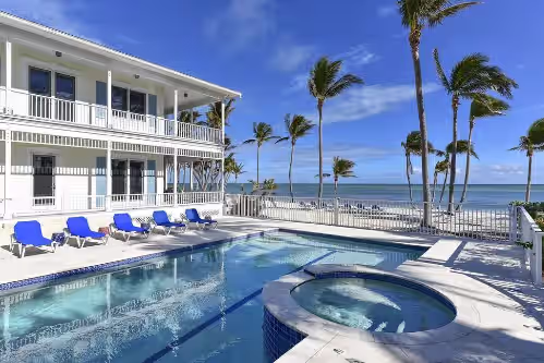 Key West Style Estate on Private Lush Beachfront Property