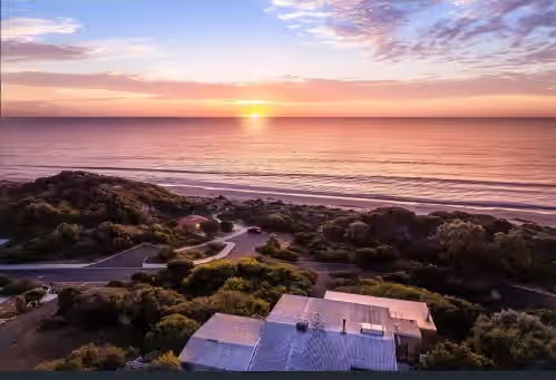 Aerial view from behind at Beachfront Mansion by Peppy Beach Retreats