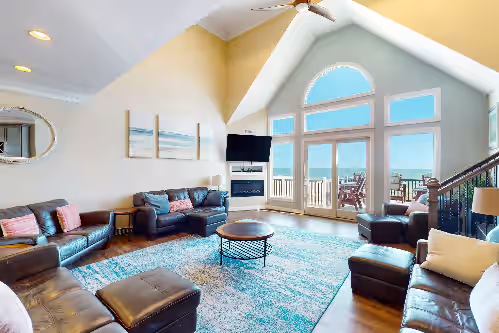 Stunning oceanfront home with private indoor/outdoor pools, game room, theater