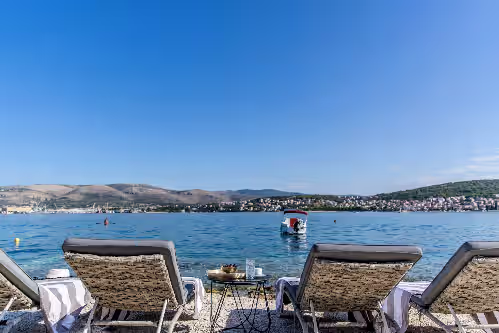 107.Elegant beach loungers set directly by the crystal-clear sea, RELAX at Luxe Seafront Villa Palace Al Nera 2 Pools,