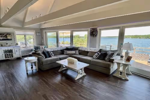Living area at Your Own Personal Tiki-Hut Paradise On John's Pond RPAM033