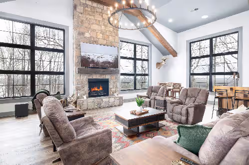 Scenic River Front Lodge With A Fire Pit And Outdoor Kitchen