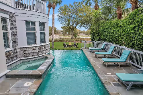 Luxury Beachfront Home with Guesthouse, Heated Pool & Spa, Putting Green, East Beach Oasis, photo 3