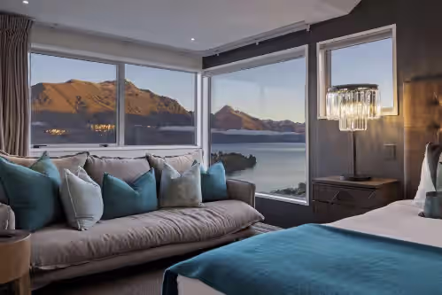 Stunning lake and mountain views from the master bedroom. at Castle Cliff Lodge