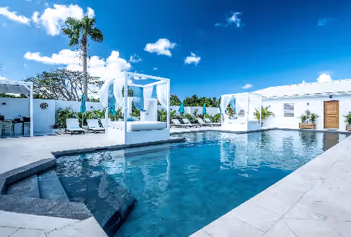 Breathtaking 180° views on the Caribbean sea. Cliff side & Private beach access