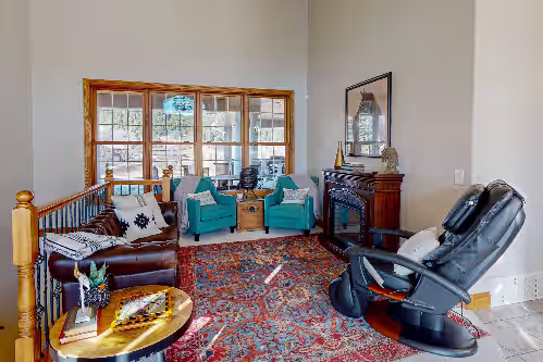 Living area at Deluxe spacious home w/private indoor pool, 2 hot tubs, game room, fireplaces