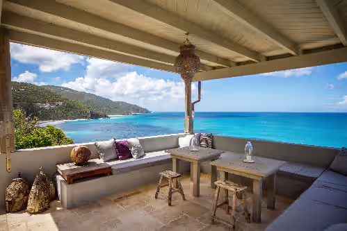 Upper level seating area at 5 bedroom villa with pool in stunning clifftop location next to gorgeous beach