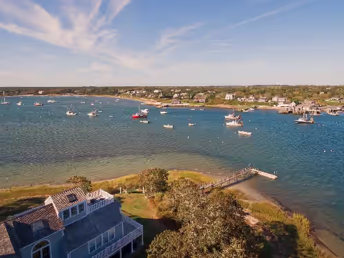 Aerial view of private dock and Stage Harbor at Stage Island Estate