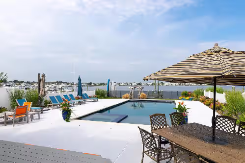 2023 home on river, across from Beach. Outdoor kitchen bath pool spa fireplace, photo 4