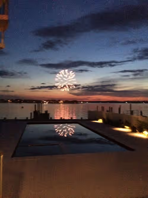 2023 home on river, across from Beach. Outdoor kitchen bath pool spa fireplace