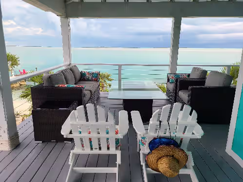 Comfortable seating on the porch. at Poco a Poco