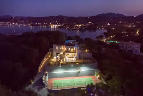 Exterior at Five Stars Villa Corfu 2 swimming pools 1 heated tennis court