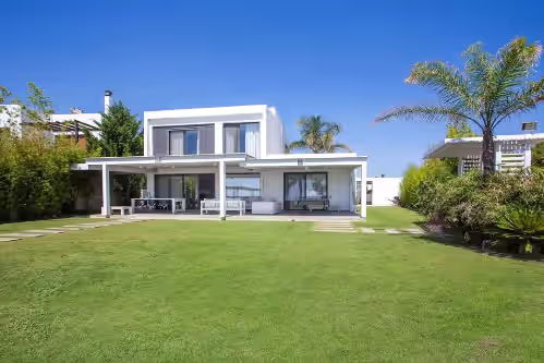 Exterior at Spacious beach front Vila with 100 sqm infinity pool, a basket ball court
