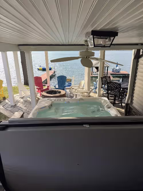 Terrace/patio at Waterfront, 138 ft Private Beach, Sunset, ADA friendly w elevator & Hot Tub