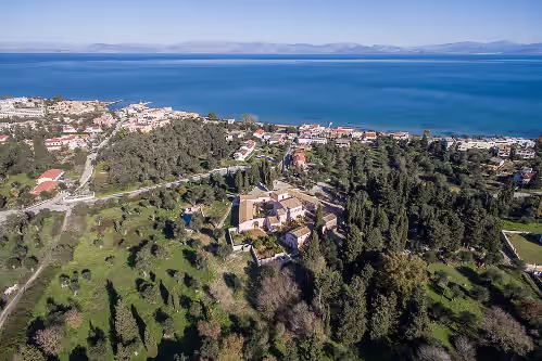 The beach with bars and tavernas is 150 metres from the front gate. at Entire luxury estate by the beach in Messonghi, Corfu