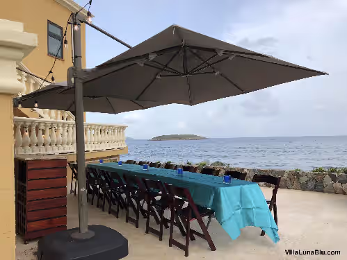 Outdoor dining at Spectacular Oceanfront 6 BDRM Expansive Villa