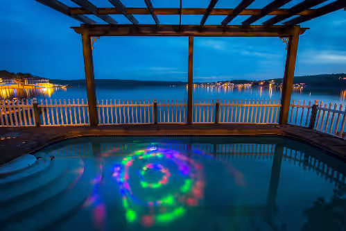 8500 sf, Sleeps 48 in beds, Pool, Hot Tub, Game Rm, 300 ft lake front, In town