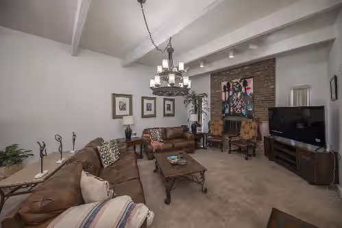 Living area at Right At Home-Midland Adobe Compound with Pool and Fire Pits and Billiards