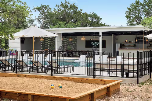 Outdoor pool, pool bar and bocce ball for you to enjoy during your stay. at The Cedars Ranch: Full Buyout of TX Hill Country