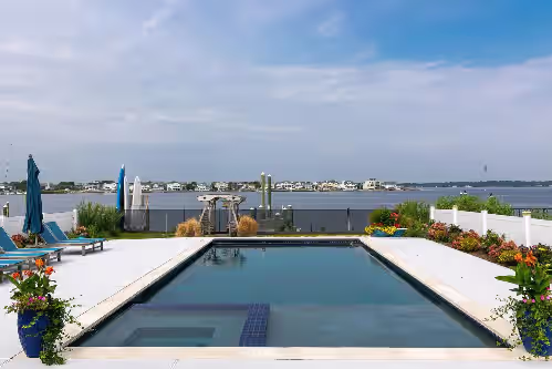2023 home on river, across from Beach. Outdoor kitchen bath pool spa fireplace, photo 2